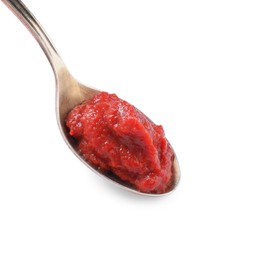 Photo of Spoon of tasty tomato paste isolated on white