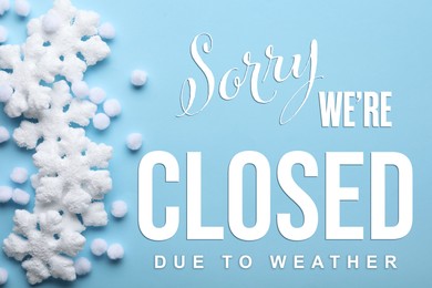 Image of Sorry we are closed due to weather sign. Text and snowflakes on light blue background