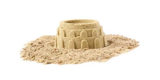 Photo of Pile of sand with beautiful castle isolated on white. Outdoor play