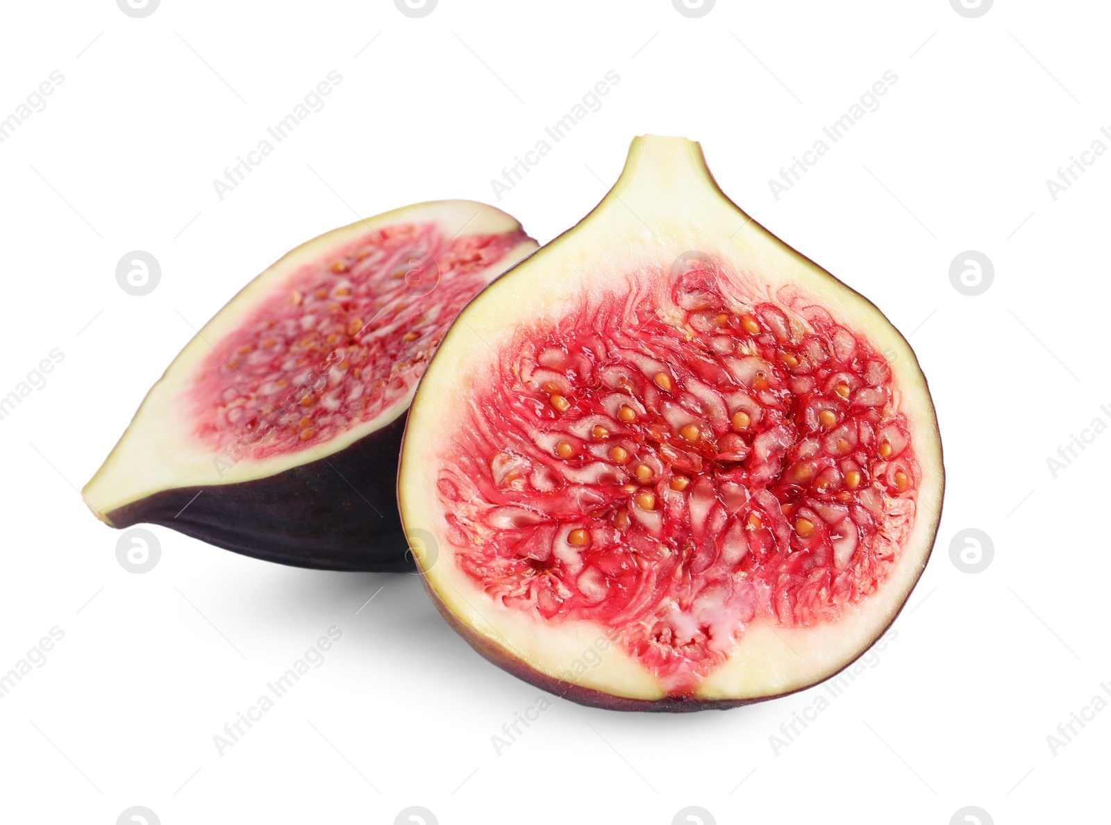 Photo of Halves of fresh fig isolated on white