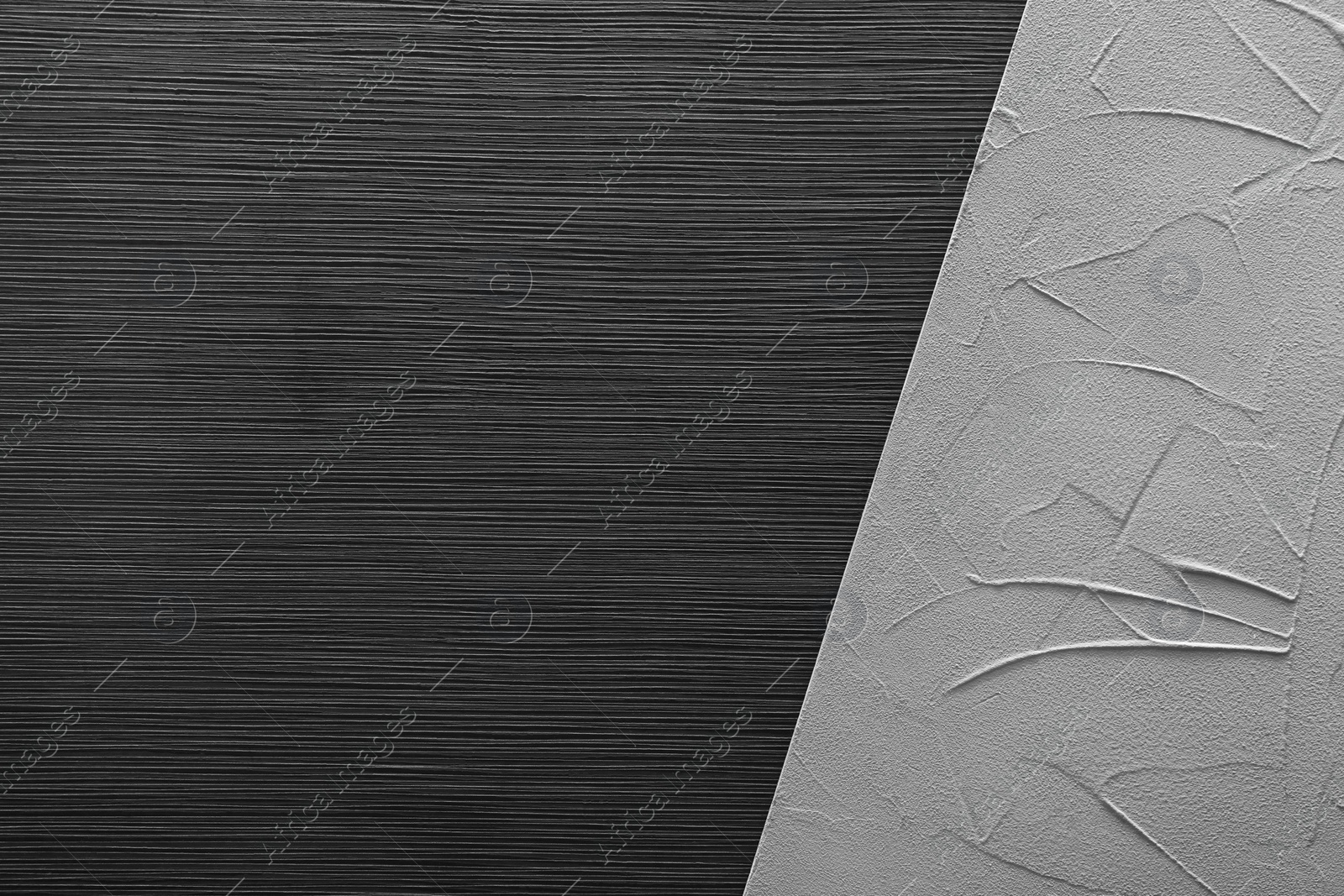Photo of Black wooden and light gray textured surfaces as background, top view