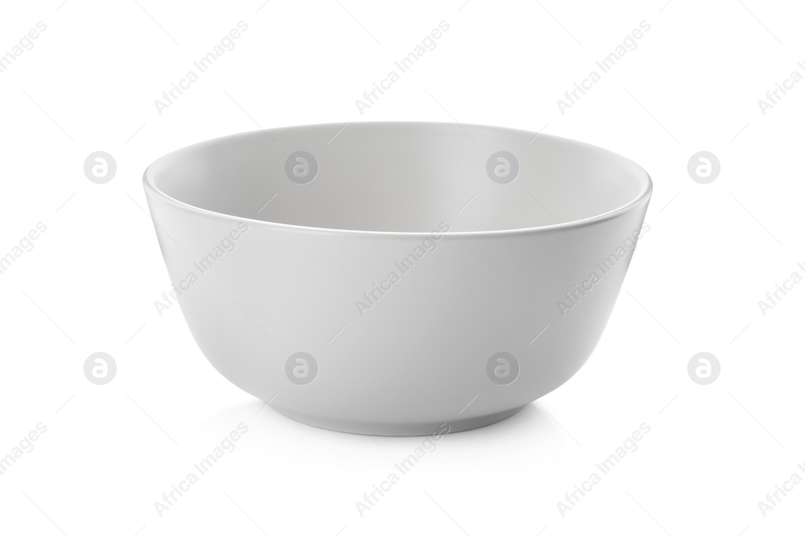 Photo of Clean empty ceramic bowl isolated on white