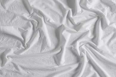 Crumpled white fabric as background, closeup view