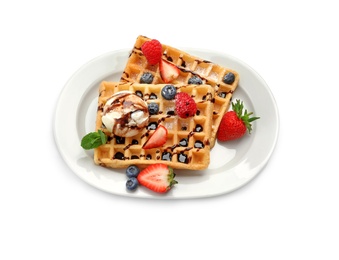 Photo of Plate with yummy waffles, berries and ice cream on white background, top view