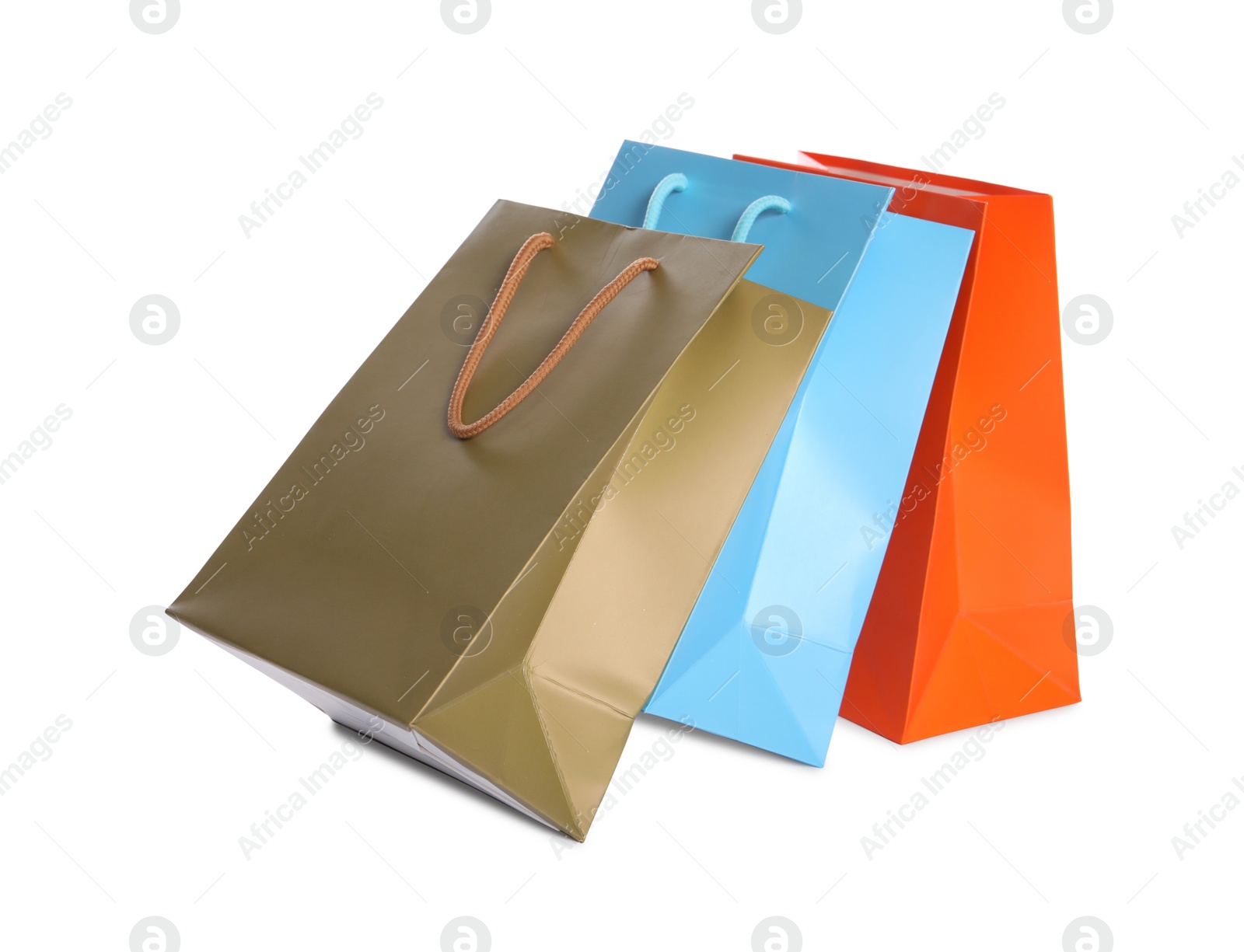 Photo of Colorful paper shopping bags isolated on white