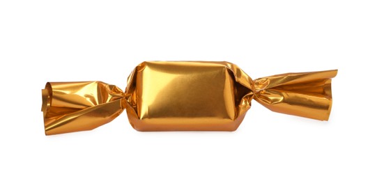 Photo of Delicious candy in golden wrapper isolated on white