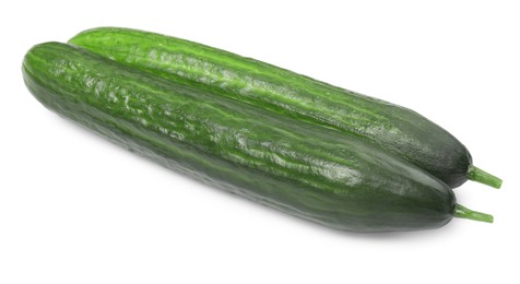 Two long fresh cucumbers isolated on white