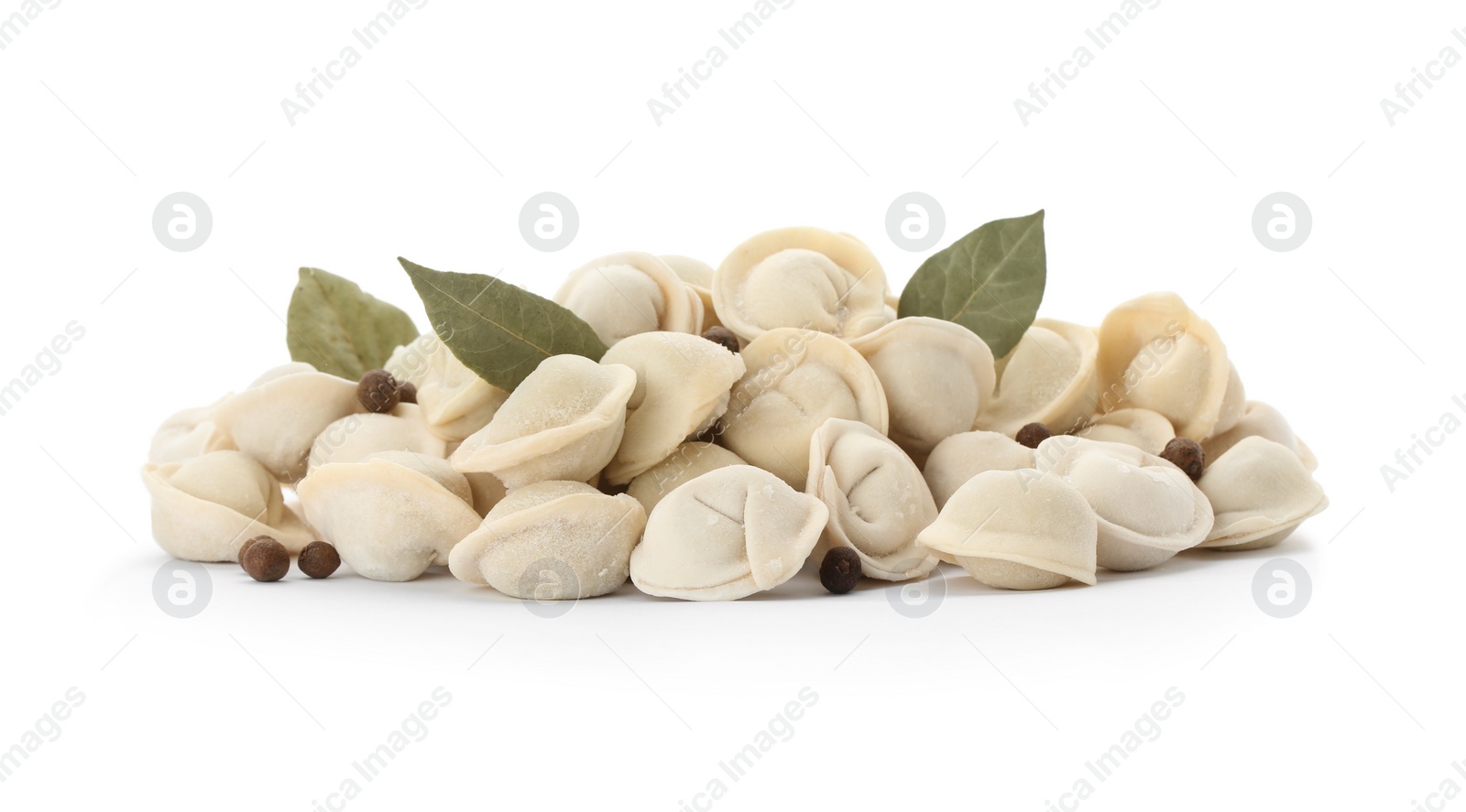 Photo of Raw meat dumplings with bay leaves and pepper on white background