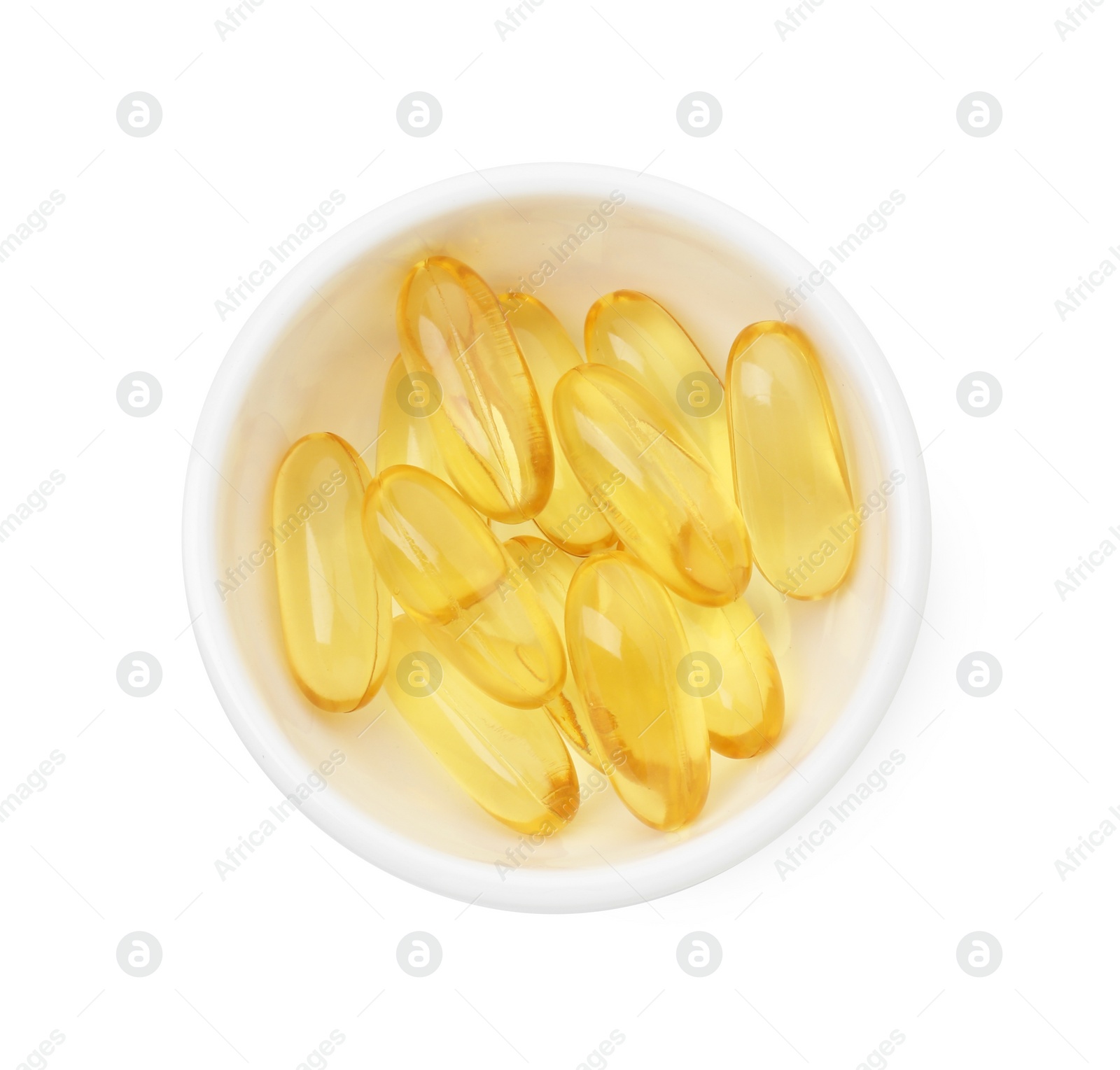 Photo of Vitamin capsules in bowl isolated on white, top view. Health supplement