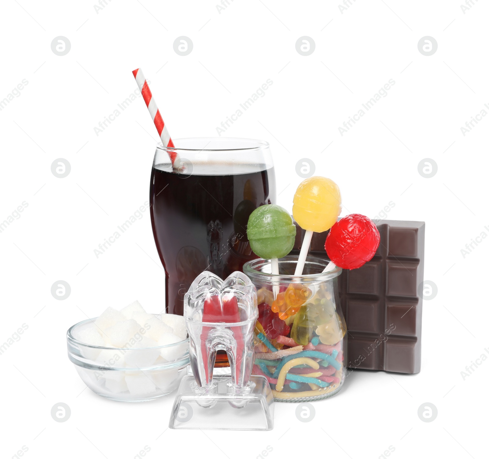 Photo of Tooth model with unhealthy food and drink on white background