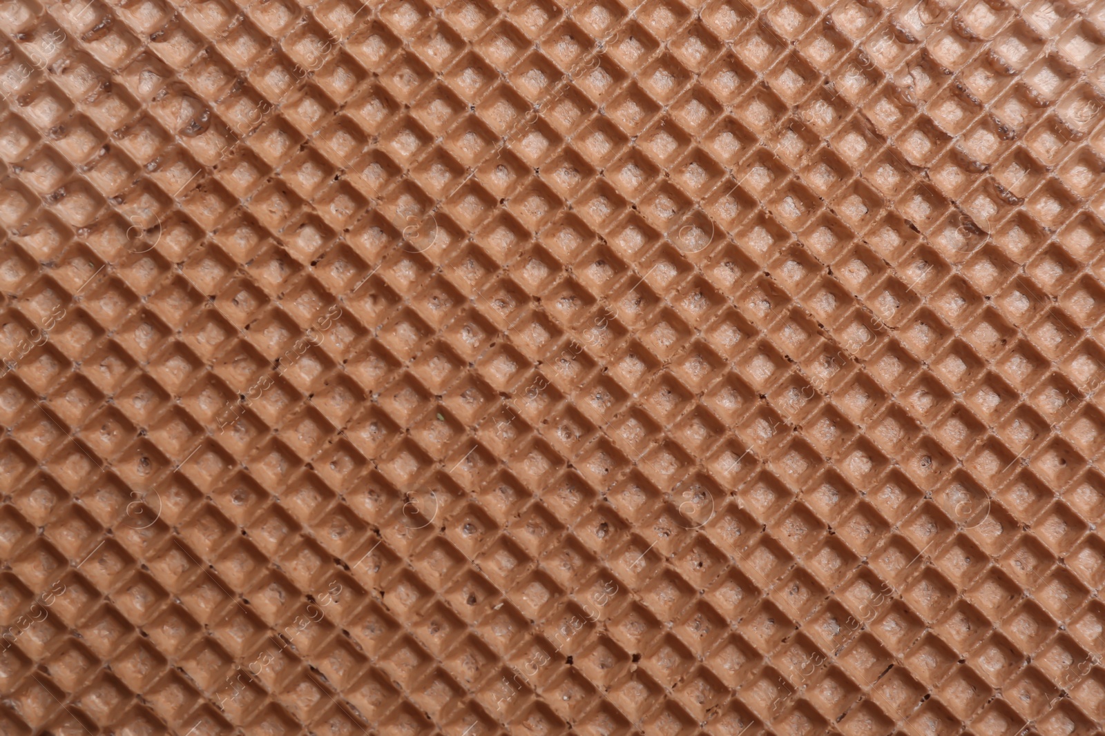 Photo of Tasty wafer as background, closeup. Crispy food