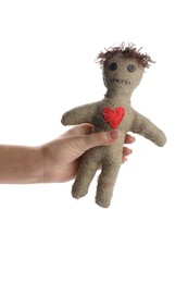 Photo of Woman holding voodoo doll with pins on white background, closeup