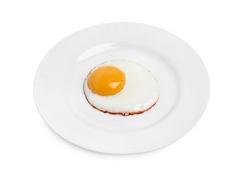 Photo of Plate with delicious fried egg isolated on white
