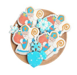 Tasty gingerbread cookies on white background, top view. St. Nicholas Day celebration