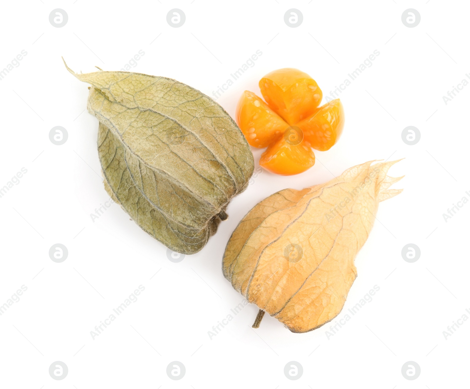 Photo of Cut and whole ripe physalis fruits with dry husk on white background, top view