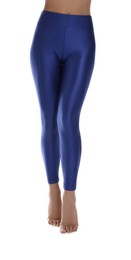 Photo of Woman with beautiful long legs wearing blue leggings on white background, closeup