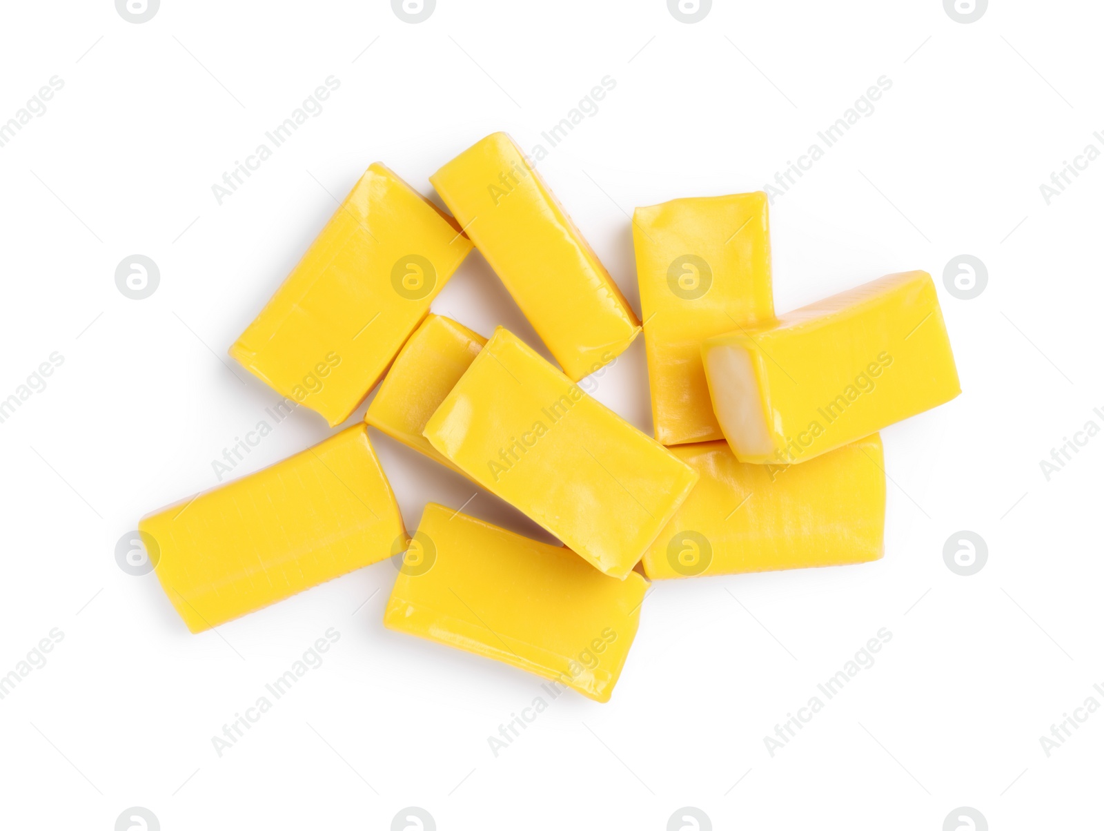 Photo of Tasty yellow bubble gums isolated on white, top view