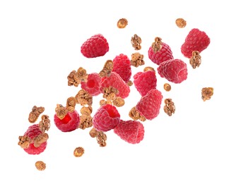 Image of Delicious granola and raspberries falling on white background. Healthy snack 