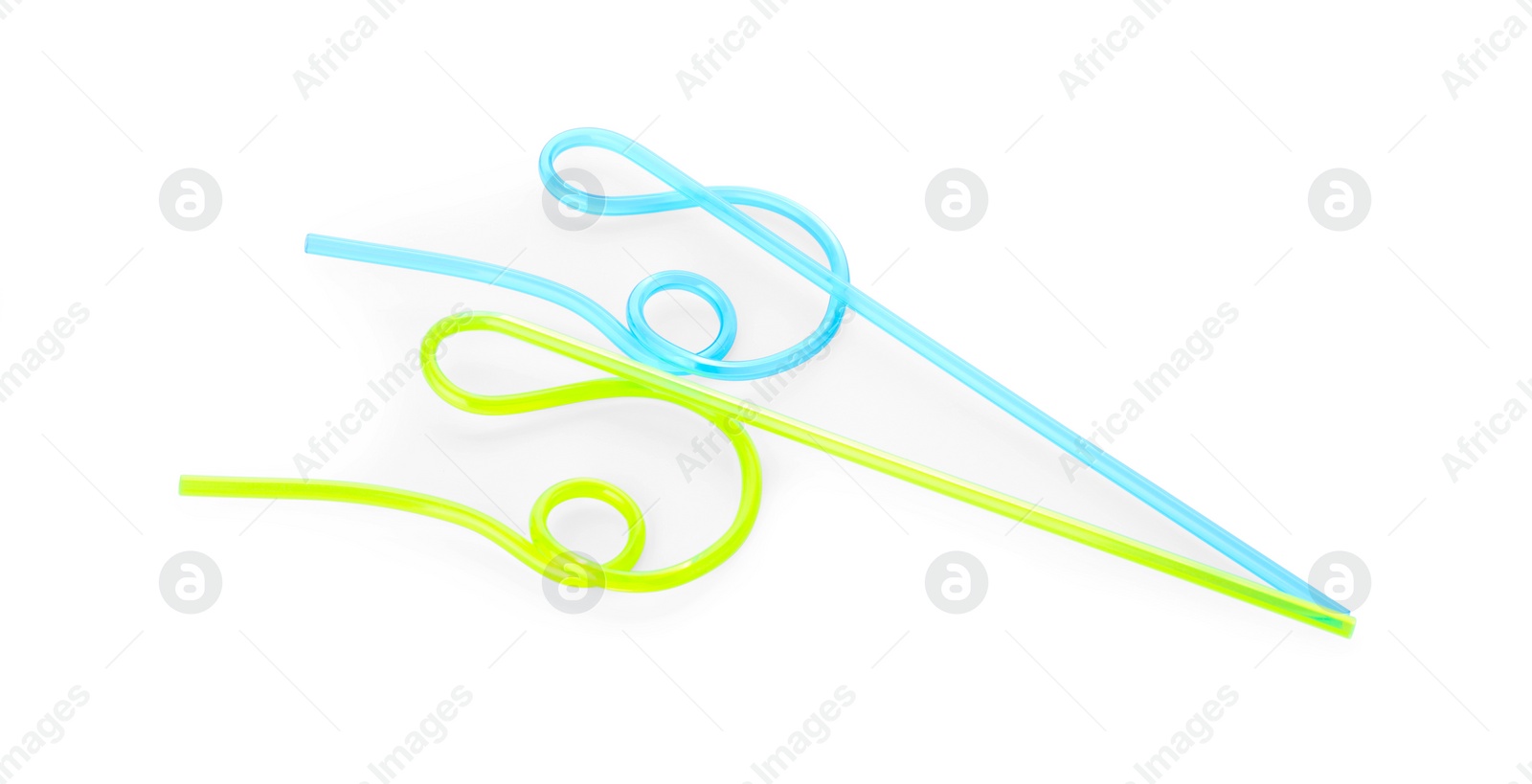 Photo of Color plastic cocktail tubes on white background