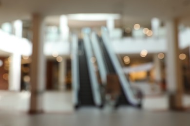 Photo of Blurred view of shopping mall interior. Bokeh effect