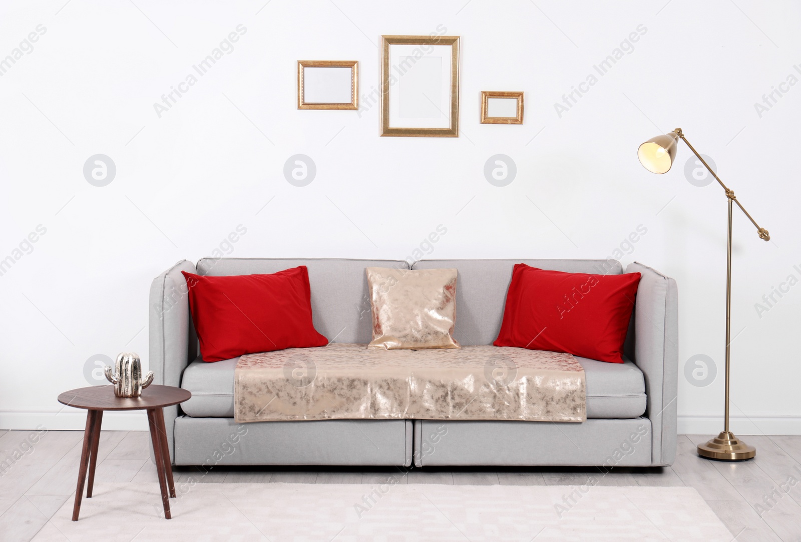 Photo of Stylish living room interior with comfortable sofa