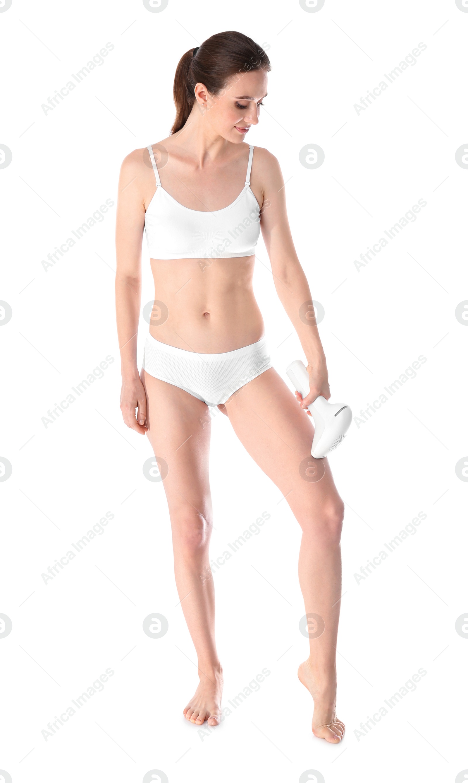 Photo of Young woman doing leg epilation procedure on white background