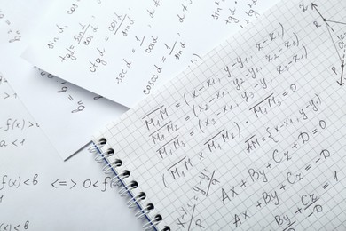 Photo of Sheets of paper with different mathematical formulas, top view