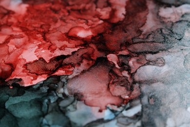Photo of Abstract liquid ink art painting as background, closeup
