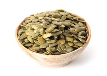 Photo of Shelled raw pumpkin seeds in bowl on white background