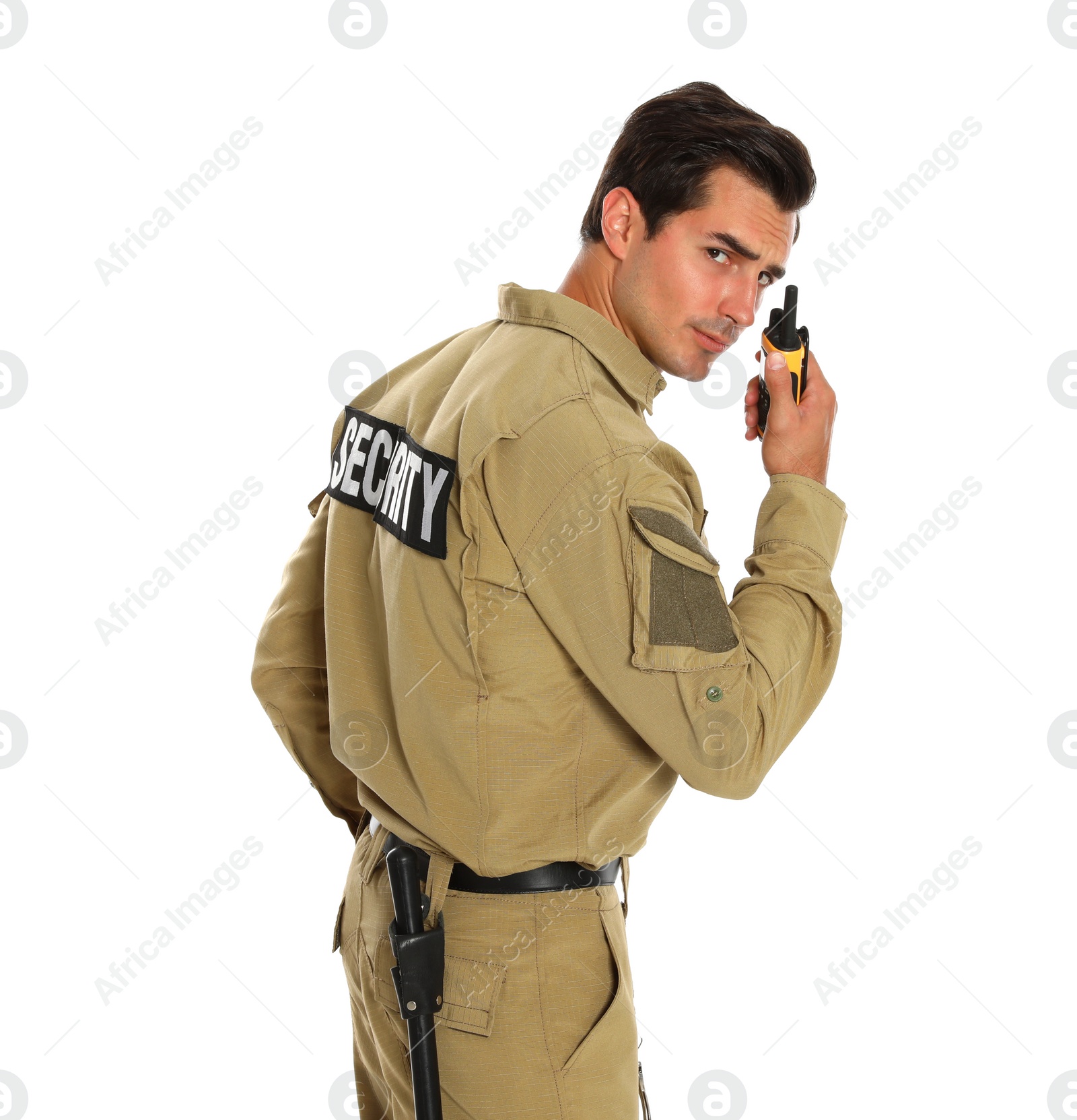 Photo of Male security guard in uniform using portable radio transmitter on white background