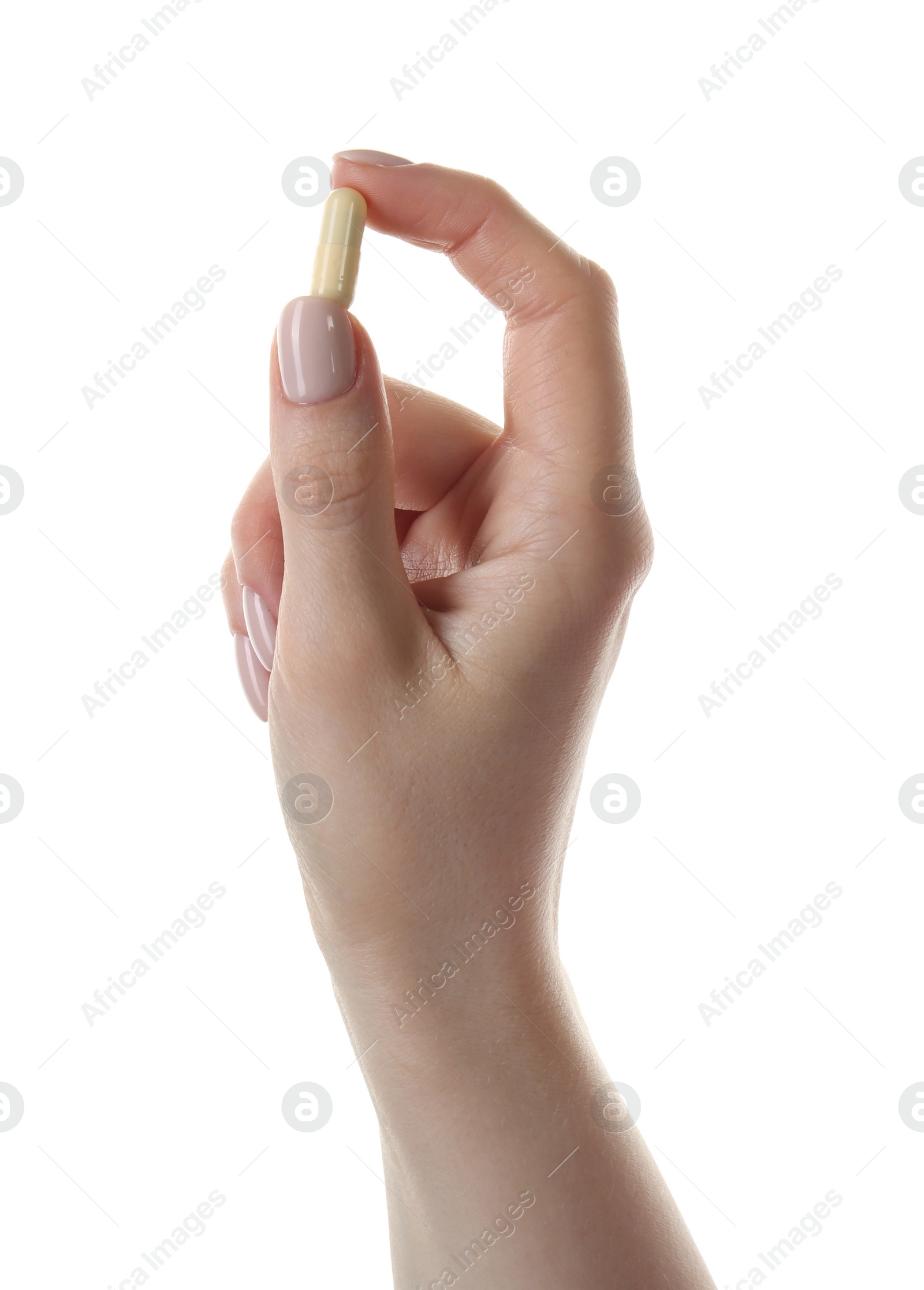 Photo of Woman holding vitamin capsule on white background, closeup. Health supplement