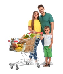 Photo of Happy family with full shopping cart on white background
