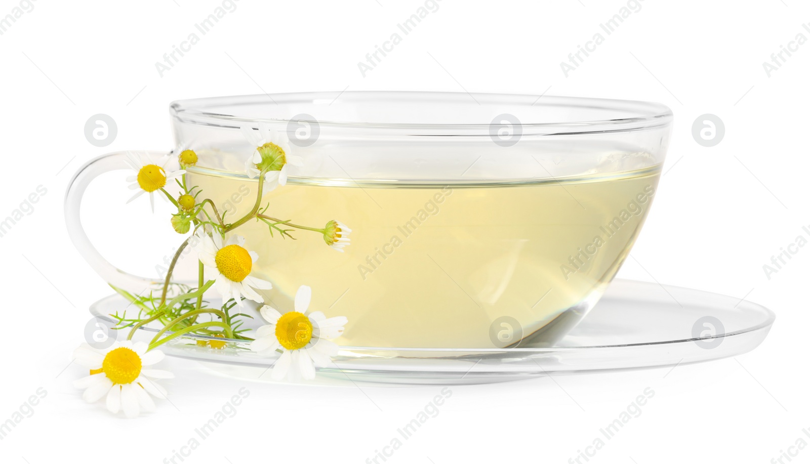 Photo of Aromatic herbal tea in glass cup with chamomile flowers isolated on white