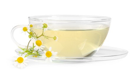 Photo of Aromatic herbal tea in glass cup with chamomile flowers isolated on white