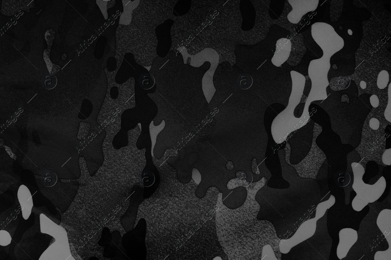 Image of Texture of camouflage fabric as background, top view. Black and white effect