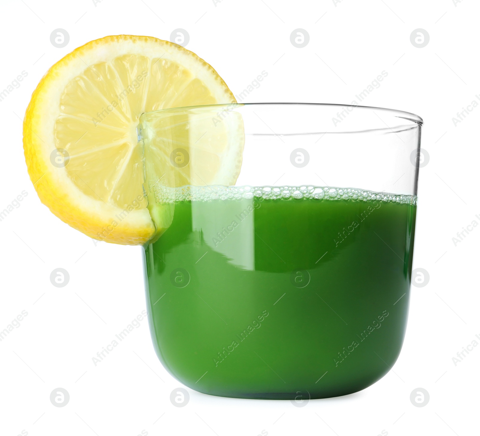 Glass of wheat grass juice served with slice of lemon on white background Photo of Glass of wheat grass juice served with slice of lemon on white background