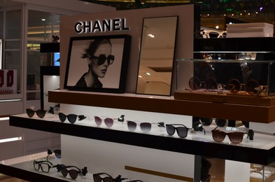 Paris, France - December 10, 2022: Chanel store display with different sunglasses