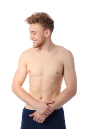 Portrait of young man with slim body on white background