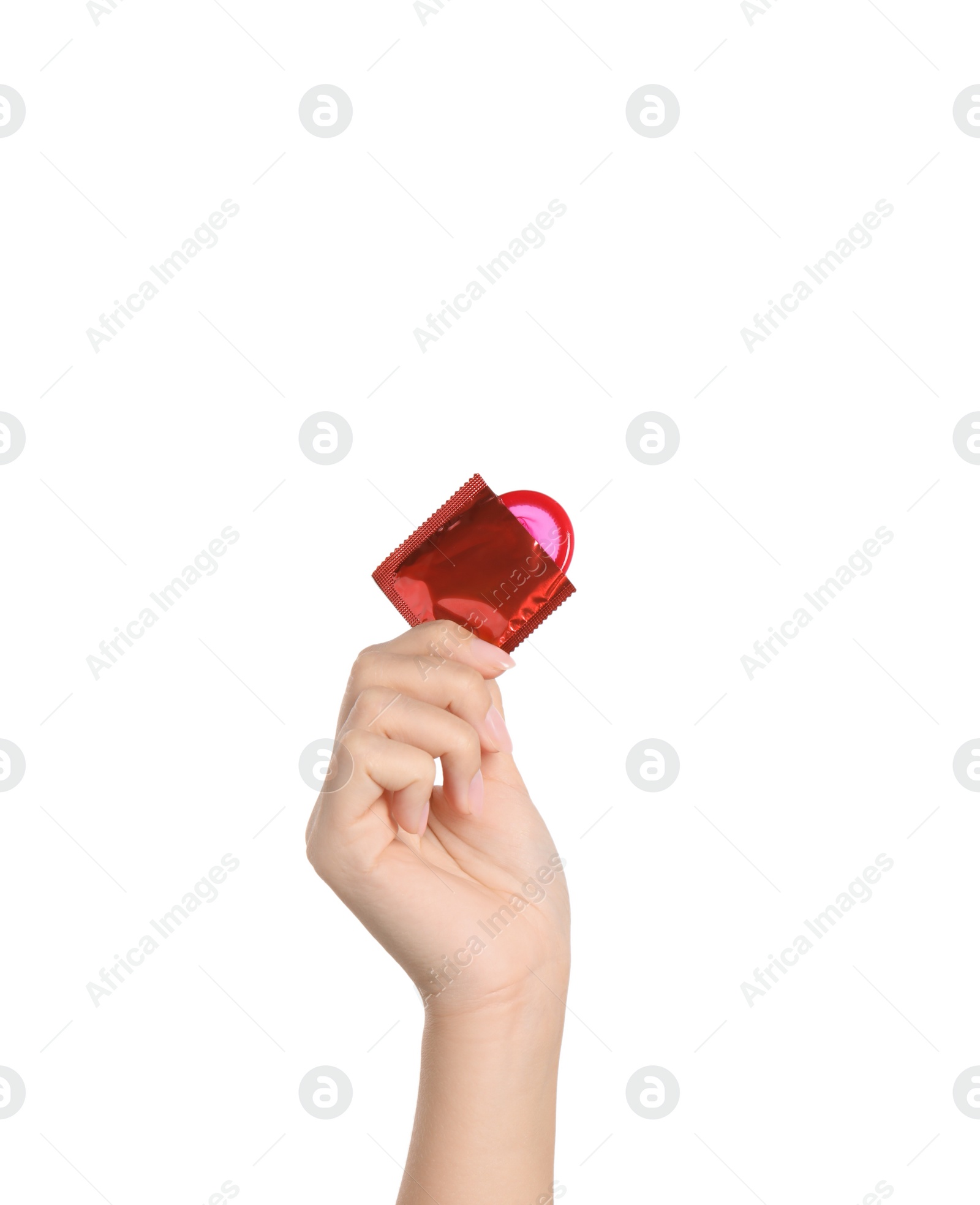 Photo of Woman holding condom on white background, closeup