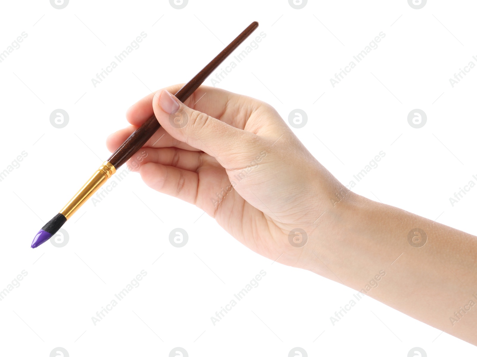 Photo of Young woman holding brush with color paint on white background, closeup