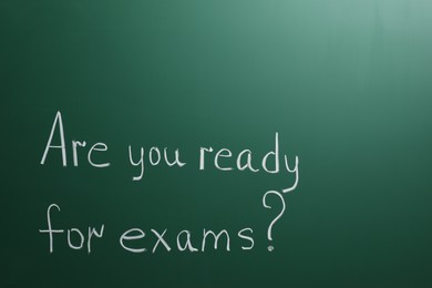 Green chalkboard with phrase Are You Ready For Exams as background