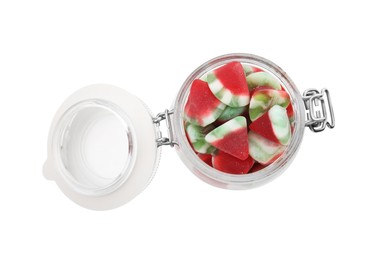 Photo of Tasty colorful candies in jar on white background, top view