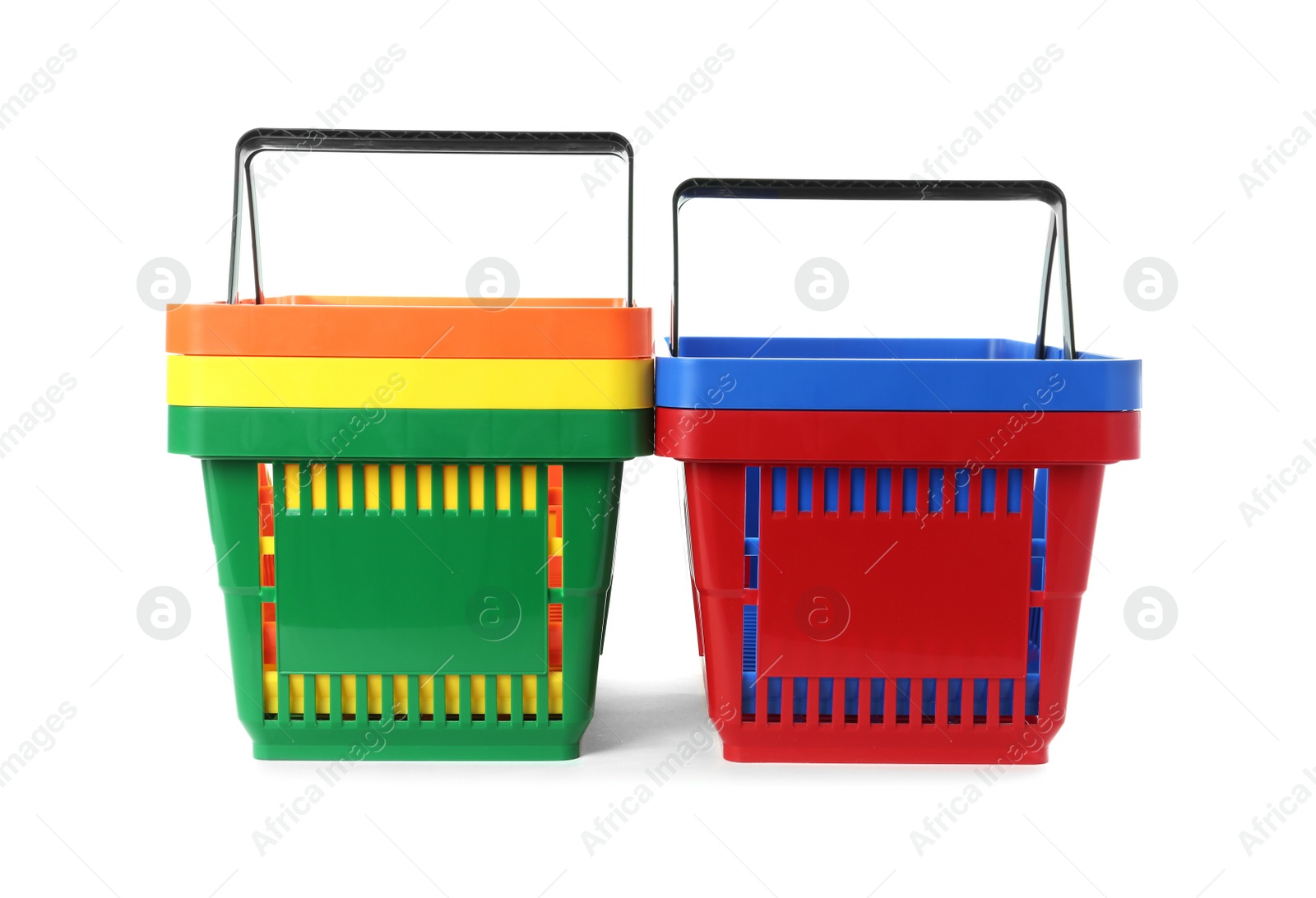 Photo of Colorful plastic shopping baskets on white background