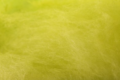 Sweet yellow cotton candy as background, closeup