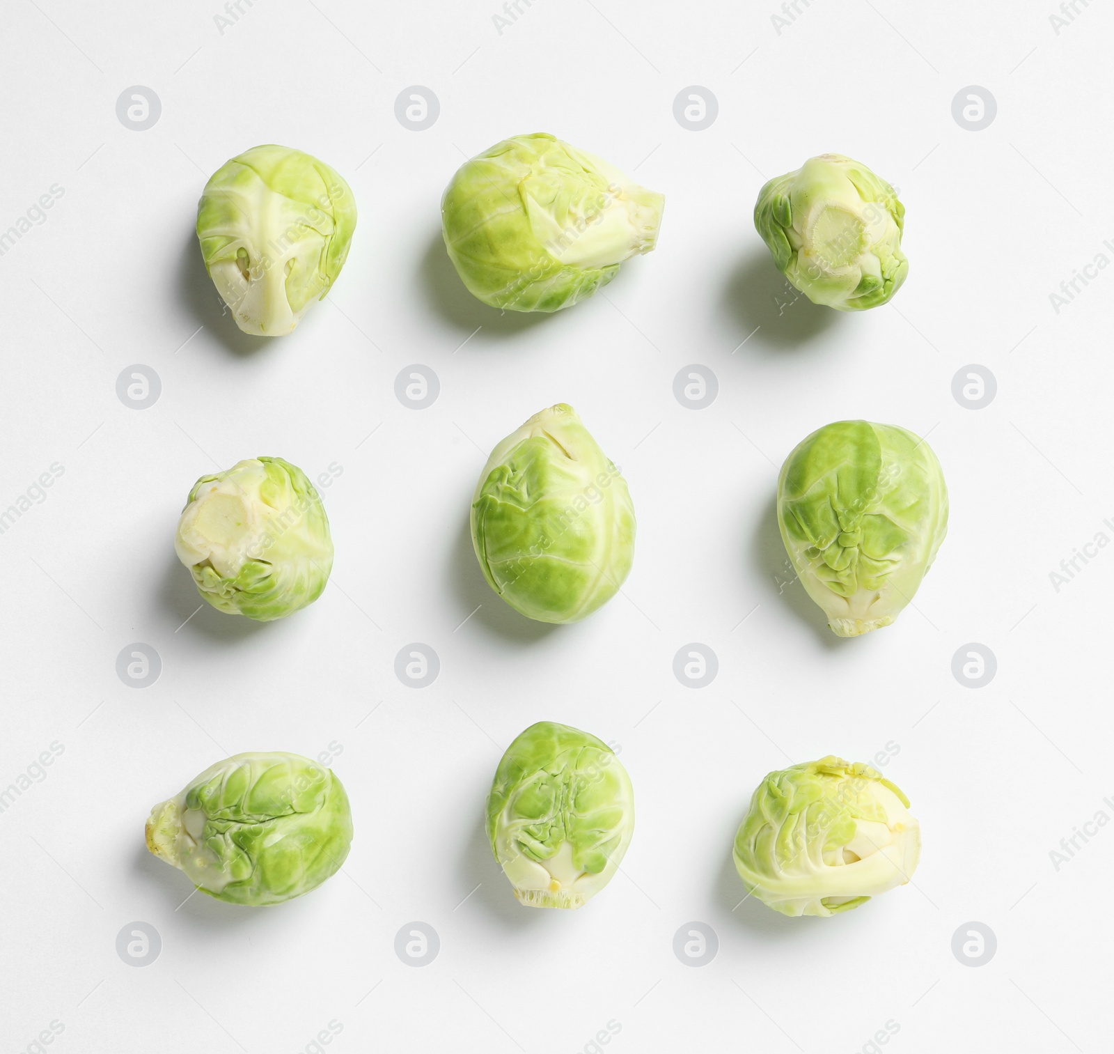 Photo of Tasty fresh Brussels sprouts on white background, top view