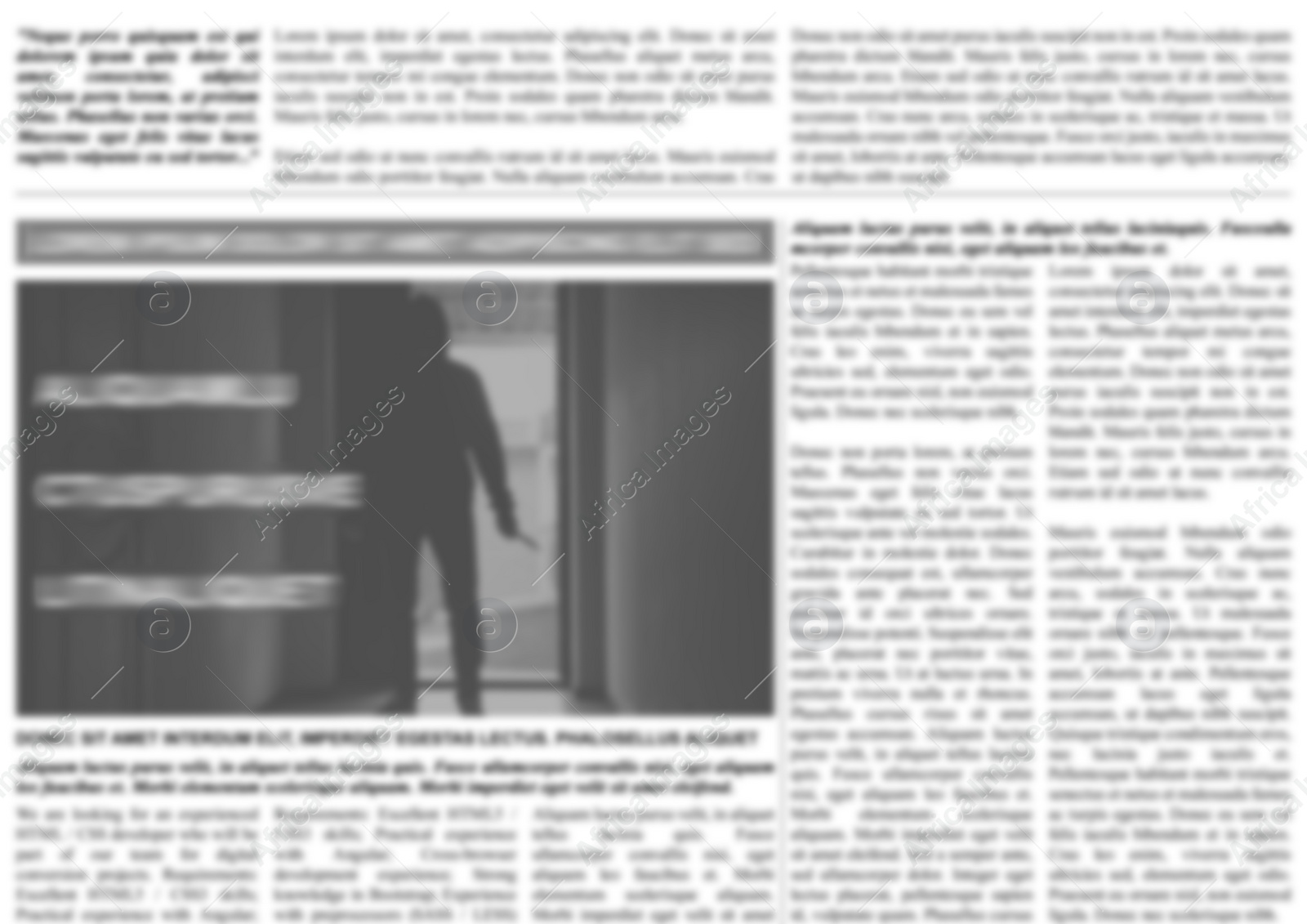 Image of Newspaper with detective article as background, blurred view