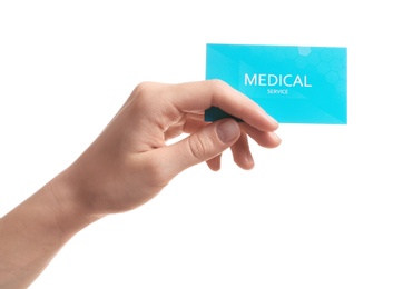 Woman holding business card isolated on white, closeup. Medical service