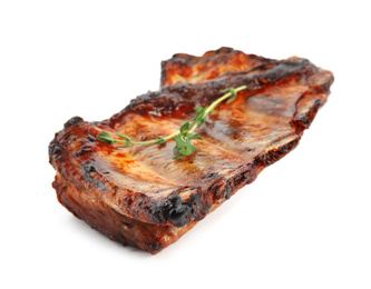 Tasty grilled ribs with thyme isolated on white