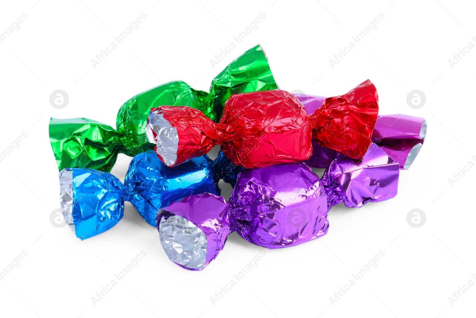 Photo of Tasty candies in colorful wrappers isolated on white