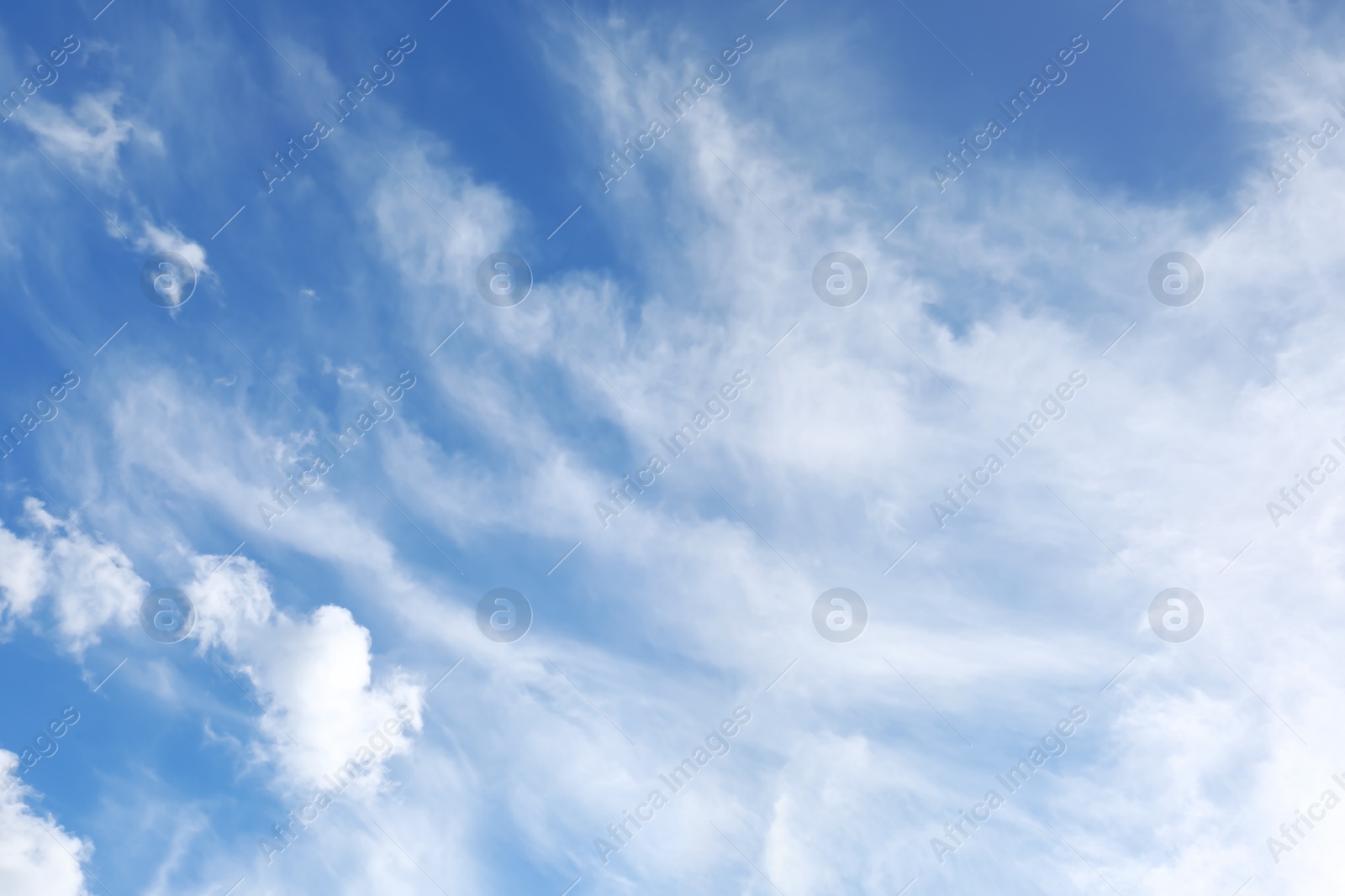 Photo of Picturesque blue sky with white clouds on sunny day